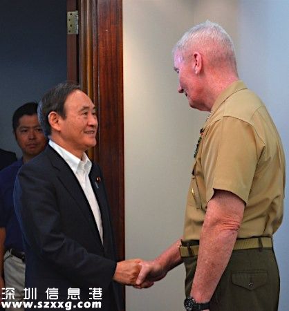 菅義偉與約翰·圖蘭
